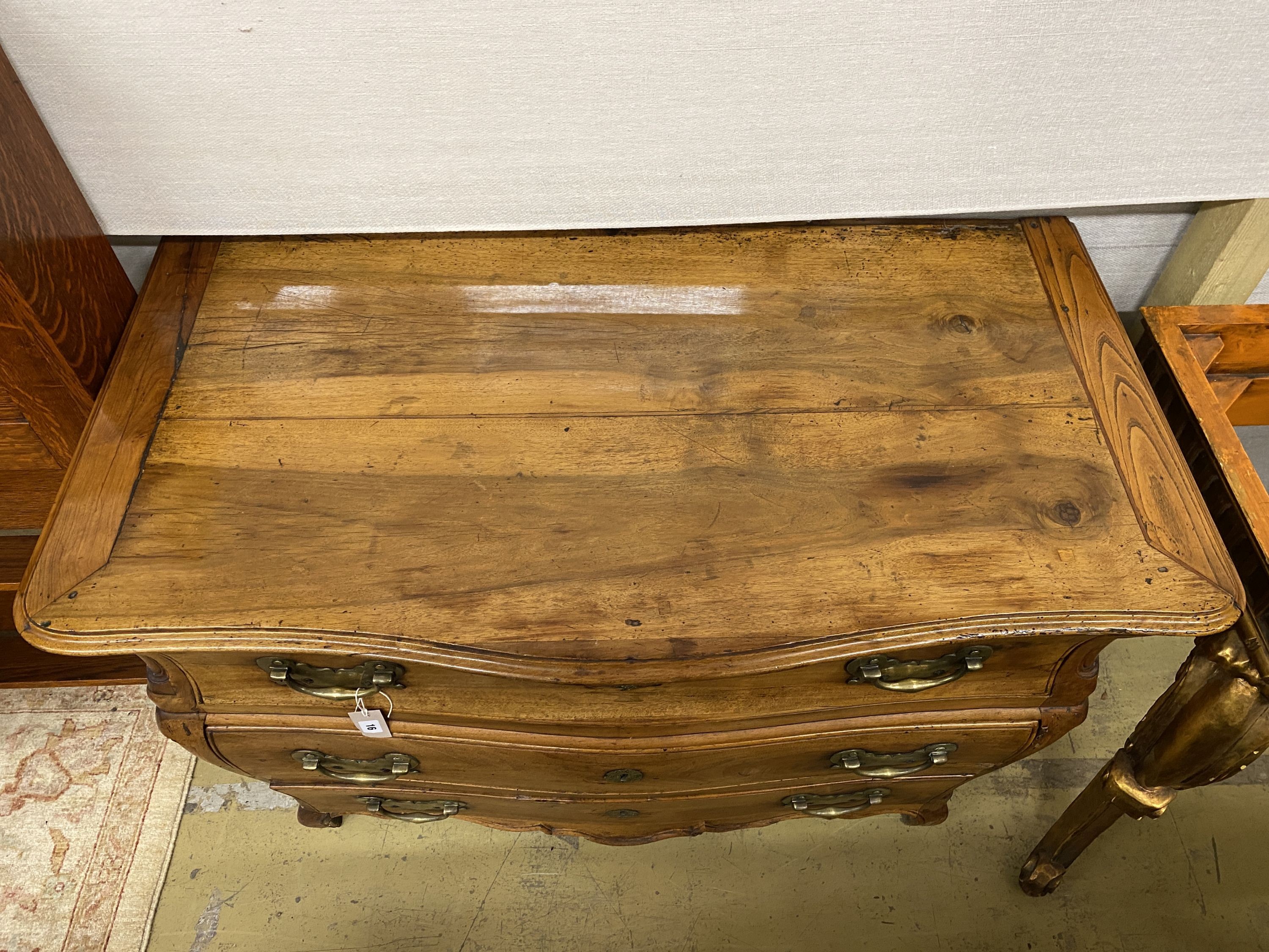 An 18th century Dutch serpentine walnut commode, width 117cm, depth 63cm, height 81cm